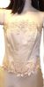 Floral Design on Criss Crossed Formal Dress  in close up